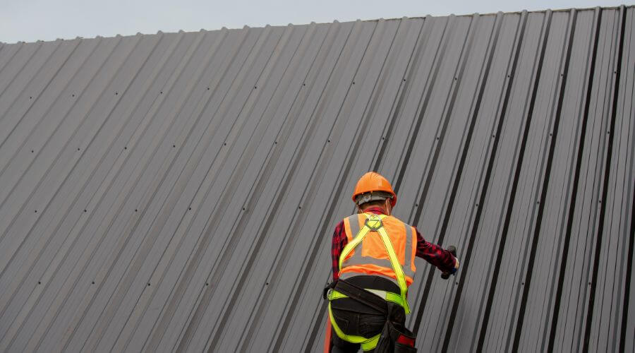 Professional metal roof installation services in Rhodes, IA